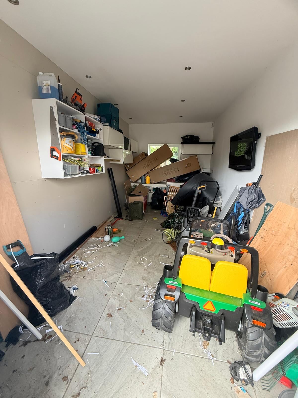 Cluttered garage space before zones and clearance