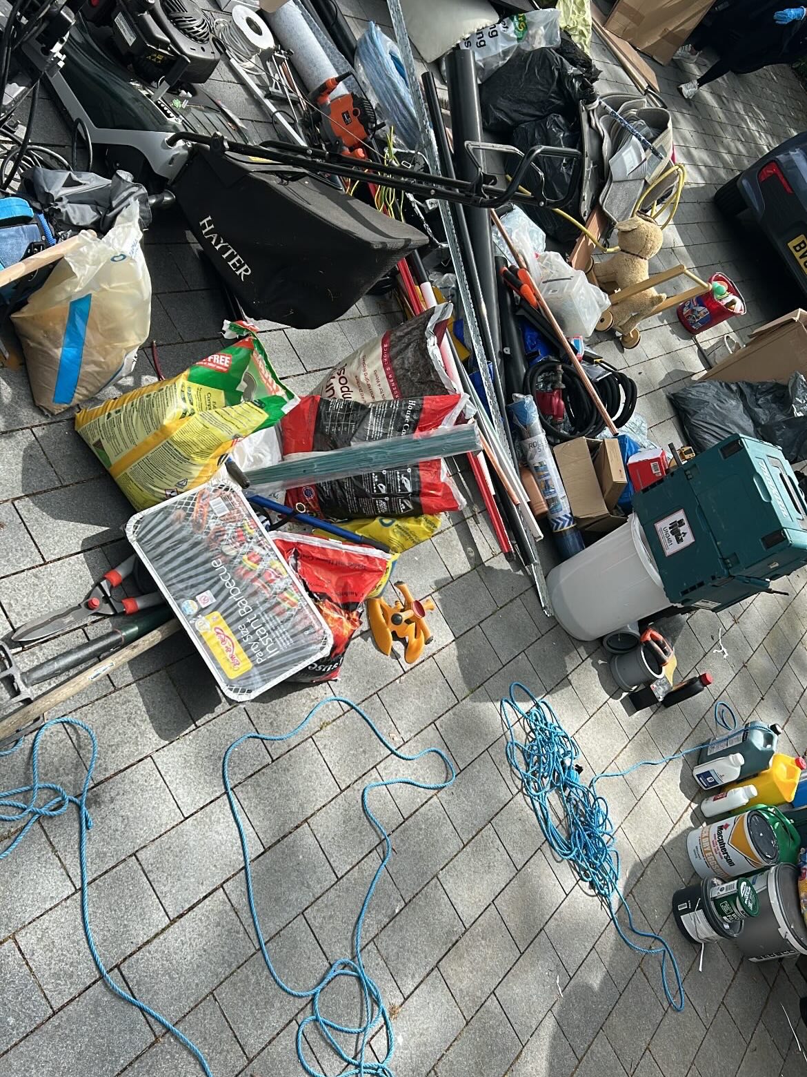 Garden and garage items sorted during rubbish clearance